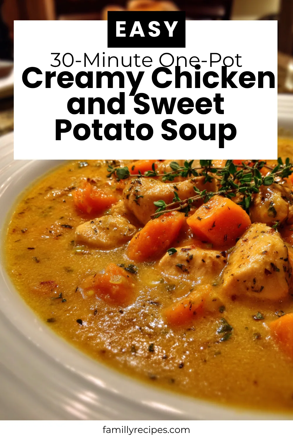 One-pot creamy chicken and sweet potato soup garnished with fresh herbs