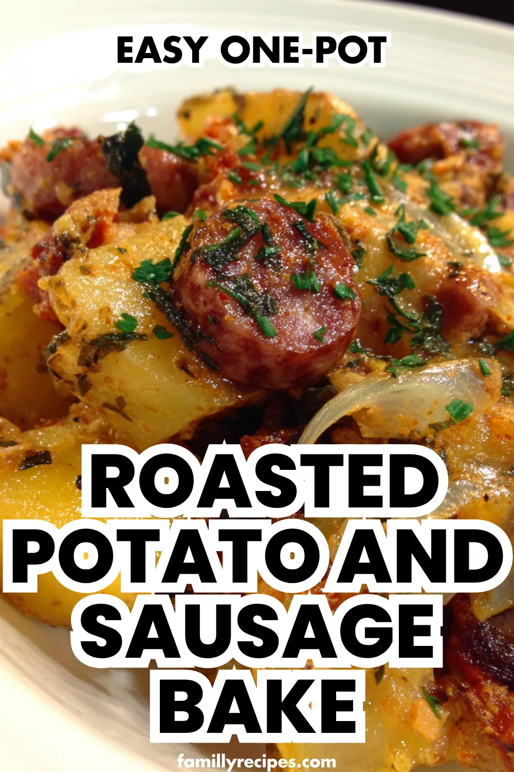 An overhead shot of the Easy One-Pot Roasted Potato and Sausage Bake on a sheet pan, showing the golden-brown potatoes and sausage.