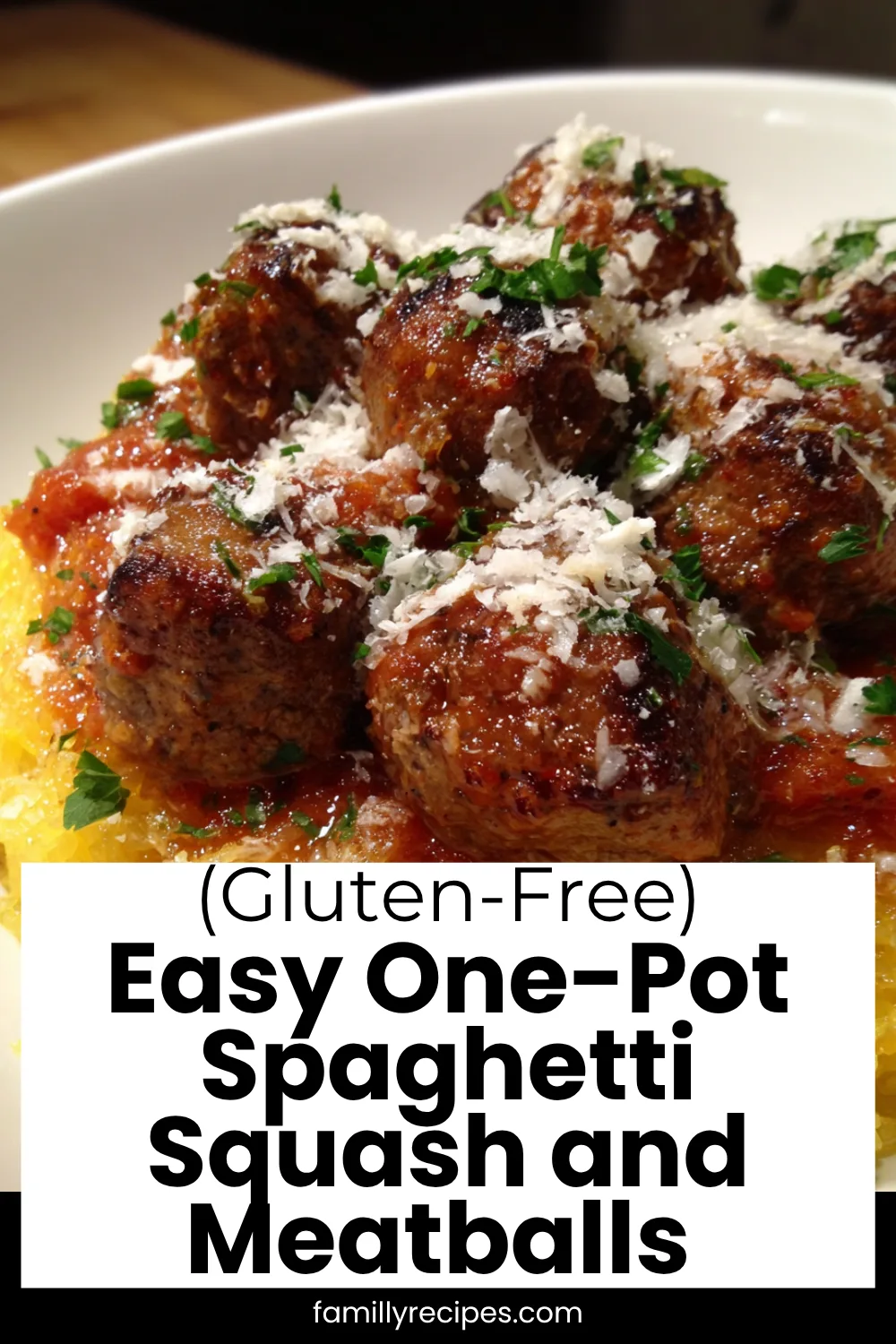 Roasted spaghetti squash “noodles” with gluten-free meatballs, marinara, and herbs, easy dinner, macro photo