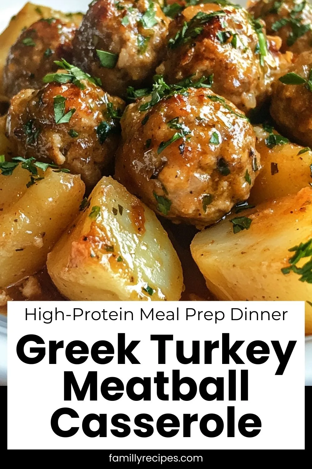 Greek turkey meatballs with roasted potatoes, tomatoes, and herbs in casserole dish, high-protein dinner