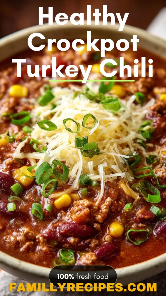 Turkey chili with beans and corn served in a bowl with toppings