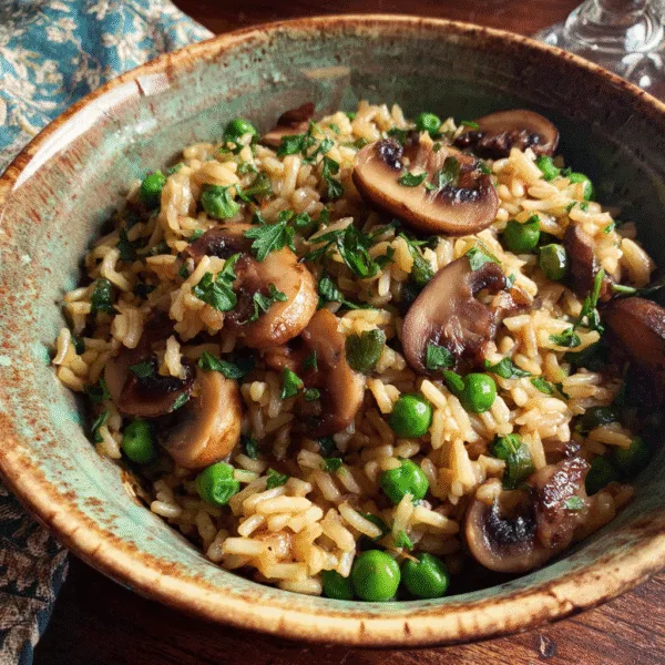 Slow cooker mushroom and brown rice casserole served in a bowl.